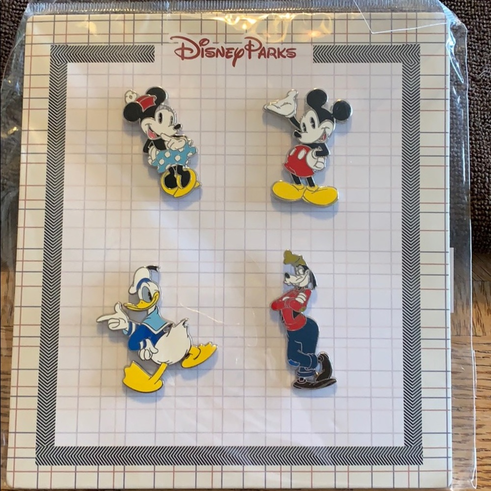 Disney Parks 4 piece Pin set Classic Characters
